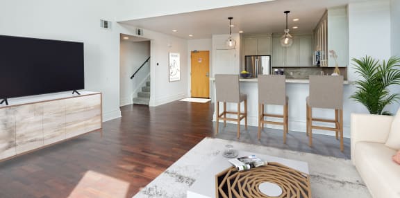 a living room and dining room with a television and a kitchen at Vendome Place, San Jose, 95110