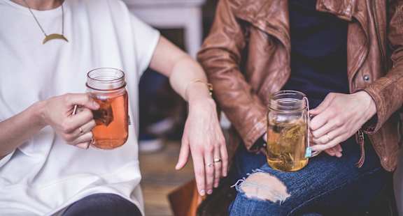 couple drinking tea at Santa Rosa Apartments