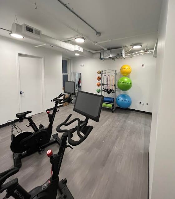 A gym with exercise equipment and a mirror. at Lofts at 629, Ohio, 44114