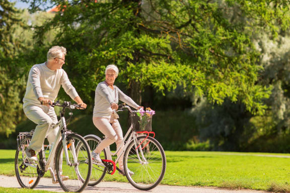 Bismarck, ND Stonefield |two-adults-riding-bike