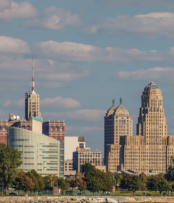 A city skyline with a mix of modern and older buildings. at The Annex Apartments, Buffalo, NY, 14222
