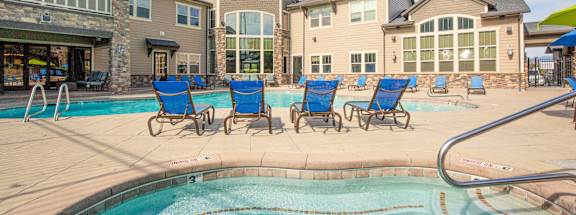 Lounge Chairs by Hot Spa and Pool at San Moritz
