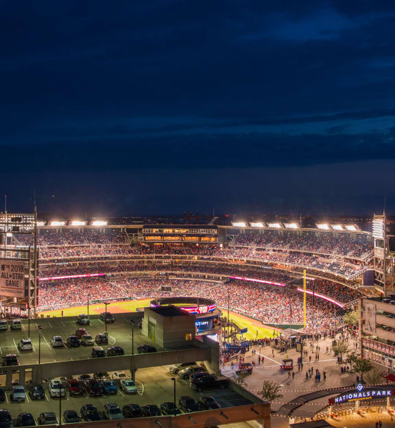 an aerial view of a baseball stadium at night