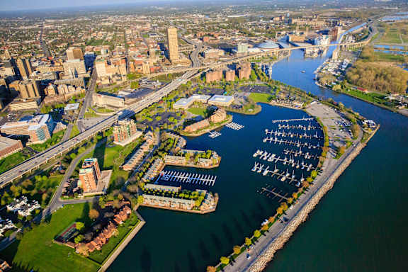 A cityscape with a river running through it at The Lofts at Elk Terminal Apartments, Buffalo, NY