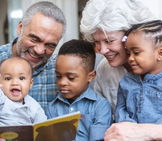 a family reading a book together