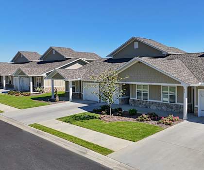 Row of houses with garages at The Ridge at Calhoun, Calhoun, GA