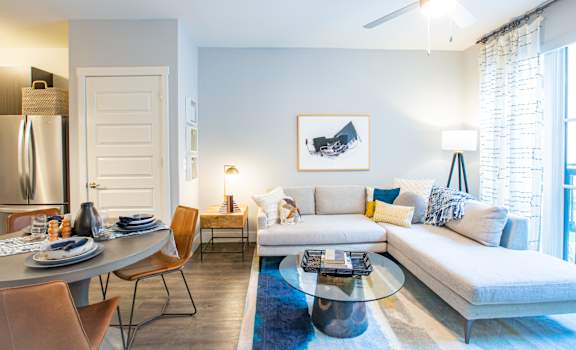 a living room with a couch table and chairs and a ceiling fan at 511 Meeting, South Carolina, 29403