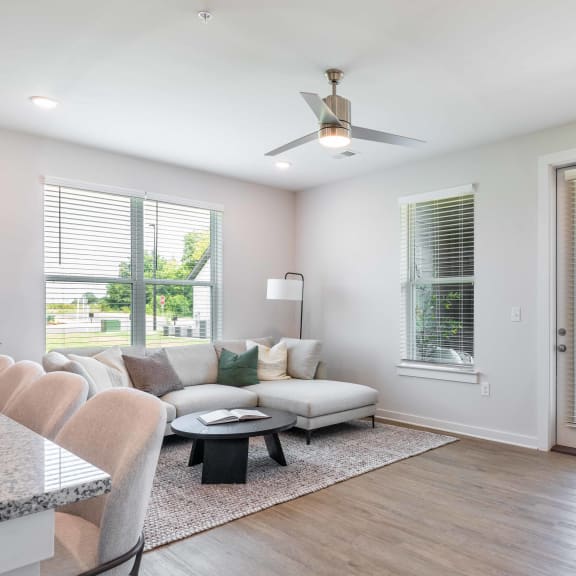 a living room with a couch and a table