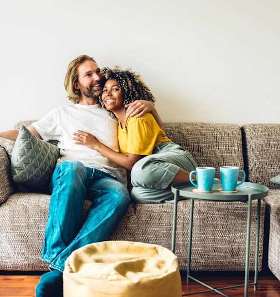 a man and a woman sitting on a couch