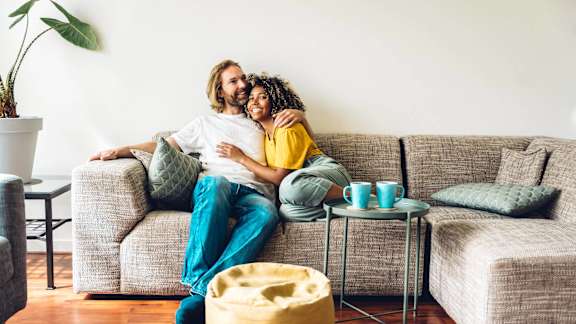 a man and a woman sitting on a couch