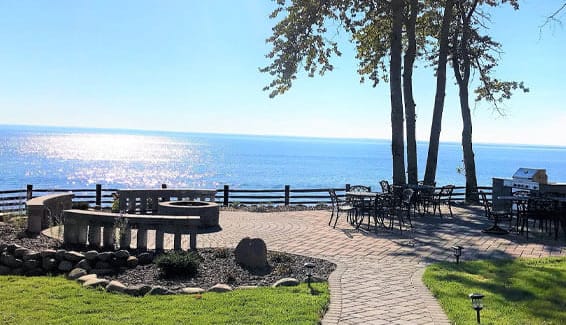 Les chateaux apartment community grilling and firepit area with beautiful views of lake superior 