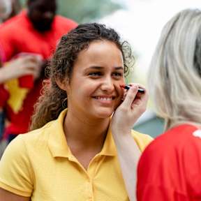 Women doing another women's makeup at Victory Northgate Apartments, Seattle, 98125