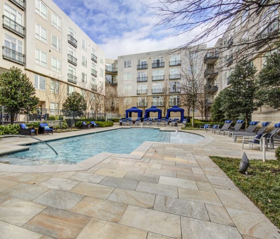 The Porter Brewers Hill Apartments Pool Area and Lounge Chairs