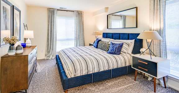 Bedroom With Expansive Windows at Westwinds Apartments, Annapolis, MD