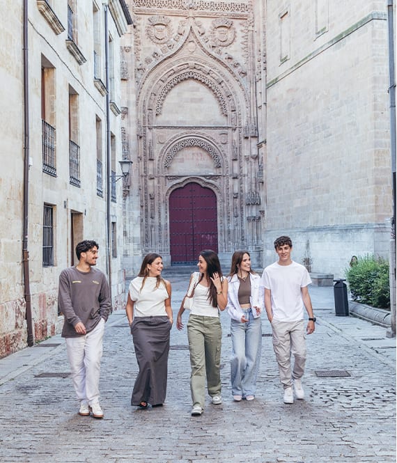 a group of people walking down a street