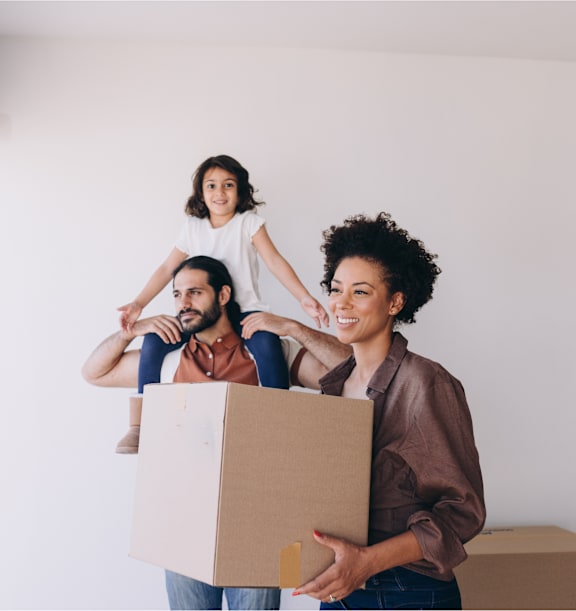 a group of people moving into a house with a box at Connect on Missour Apartments, Phoenix 85015