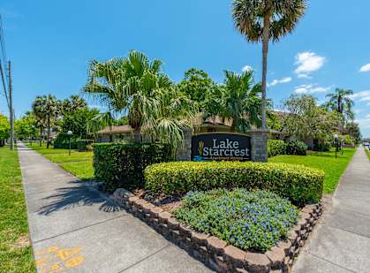 take a walk down the sidewalk to the lake stewards sign