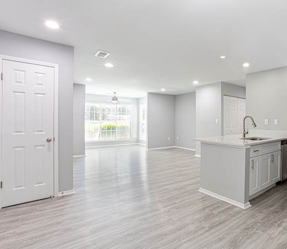 an empty kitchen and living room with a door to a window at Keita 1875, College Park, GA 30349