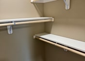 Thumbnail 48 of 48 - A white ladder is leaning against a wall.