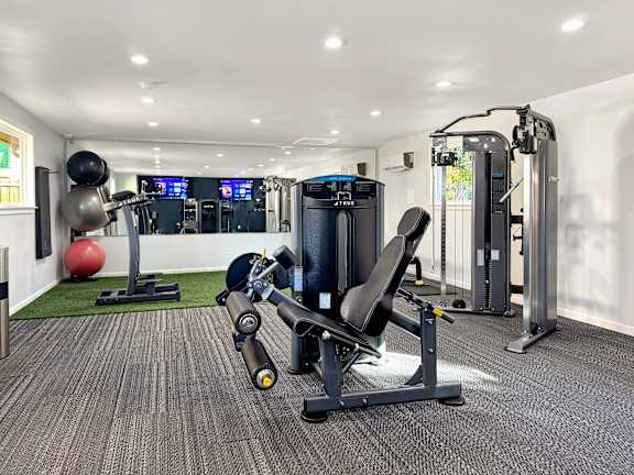 the gym at the flats at big tex apartments