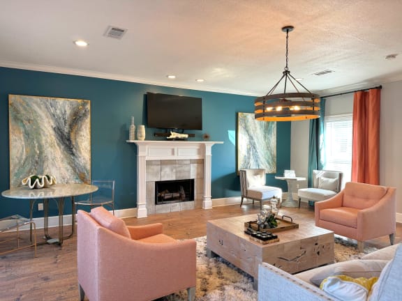 Clubhouse with a Fireplace at The Vineyard at Castlewoods Apartment Homes, Brandon, 39047