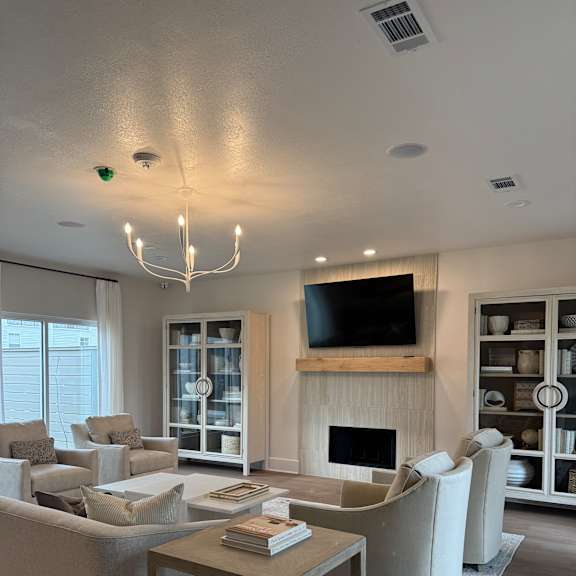 Clubhouse with a Fireplace at The Vineyard at Castlewoods Apartment Homes, Brandon, 39047