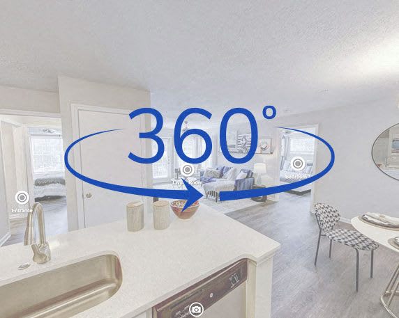 A kitchen with a 360 degree view of the room.
