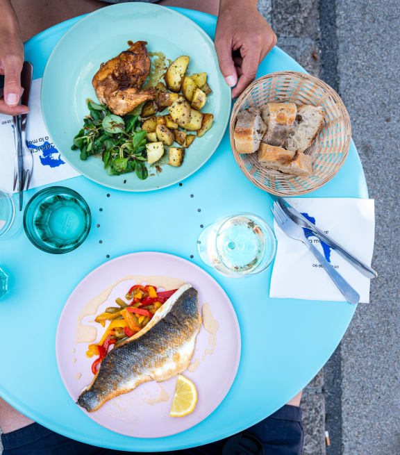Table with food on it at Lake Lofts at Deerwood, Jacksonville, FL, 32216