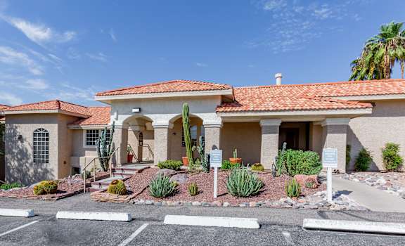 a house with a parking lot in front of it at Promontory, Tucson