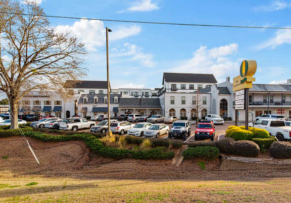 parking lot with cars with sign at Eastover Commons Residential, Mississippi, 39216