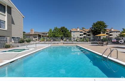 take a dip in the resort style pool at the whispering winds apartments in pearland, tx