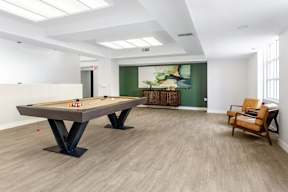 Club Room with Billiards at Grand Plaza Senior Apartments in Los Angeles, CA