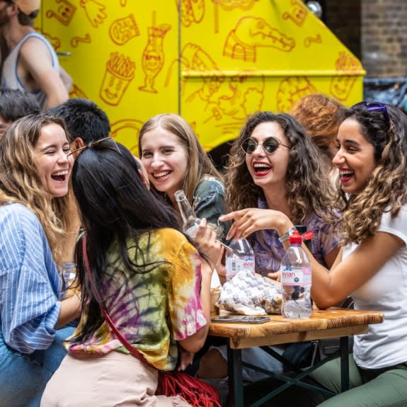 a group of people sitting at a table