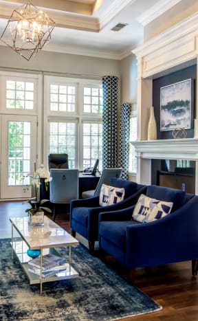 a living room filled with furniture and a fire place