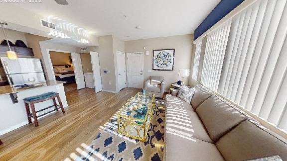 a living room with a couch and a table