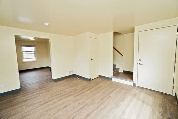 Oxford Village Townhomes – Living Room – Amherst Area – Appliances Included - 24 Hour Emergency Maintenance – Carpeting – Storage – Ask for a Tour -- Internet and Cable Ready - Affordable - Remolded –