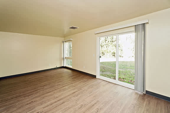 Parkside Houses – Living Room – Amherst Area – Appliances Included - 24 Hour Emergency Maintenance – Carpeting and Vinyl Plank Flooring – Storage – Ask for a Tour -- Internet and Cable Ready - Afforda