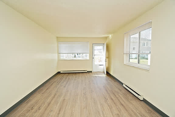 Sundridge Apartments – Living Room – Dining - Buffalo Area – Appliances Included - 24 Hour Emergency Maintenance – Carpeting - Pet Friendly – Ask for a Tour -- Cable Ready - Extra Storage