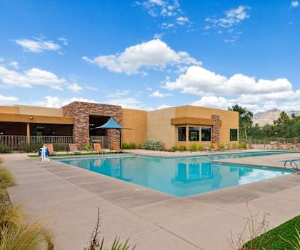 a swimming pool in front of a building at Pima Canyon, Arizona, 85704