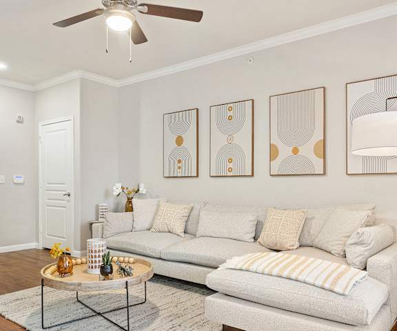 a living room with a couch and a coffee table at The Fairways at Star Ranch, Hutto, Texas
