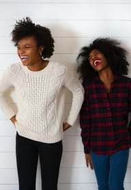 Two people standing against a white wall. at Crown Pointe, Lakewood, WA, 98499