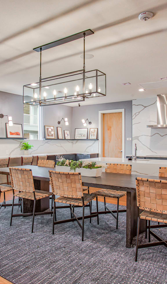 a kitchen and dining room with a large table and chairs at Presidium Revelstoke, Texas