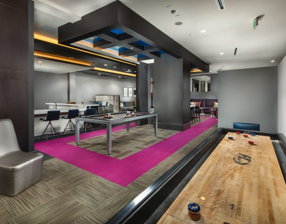 topaz game room with pool table and shuffle at Topaz Apartments, Los Angeles, California