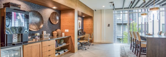 the interior of a restaurant with a bar and a dining room at Presidium Revelstoke, Texas