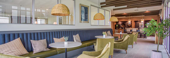 the lobby of a restaurant with couches and chairs at Presidium Revelstoke, Fort Worth, TX, 76131