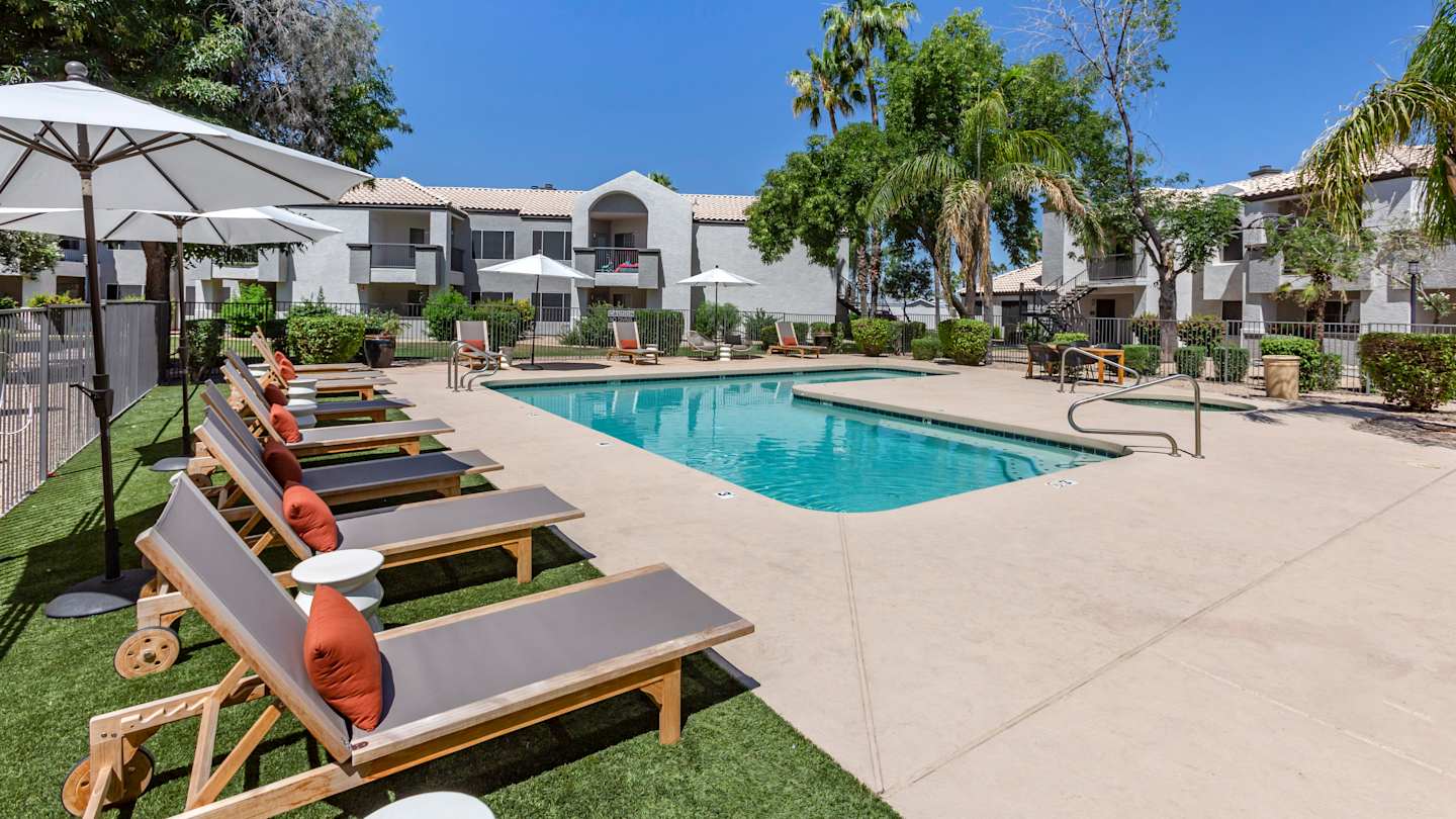 Pool and poolside area at Boulders at Lookout Mountain Apartment Homes.