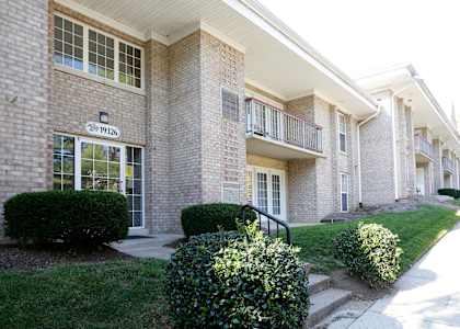 Apartment building with the number 193366 on the front. at Shenandoah Station Apartments, Triangle