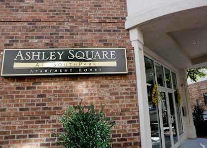 A sign that says Ashley Square at Southpark Apartment Homes.