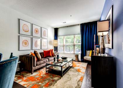 a living room with a couch and a table
