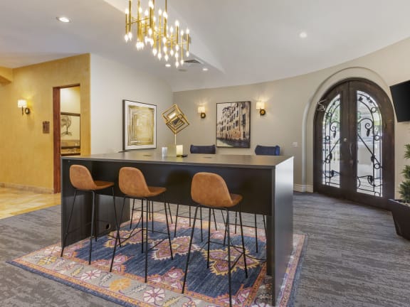 a room with a desk and chairs at Trevi Apartment Homes, Arizona, 85224